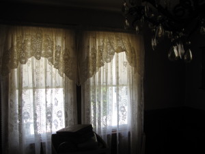 beautiful lace curtains for the window that needs a life.